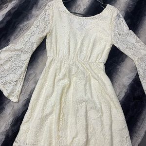Cream lace material date/ party dress.